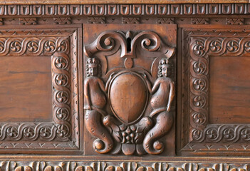 an old ornamental wooden sculpture at Corvin Castle in Hunedoara city - Romania 06.Aug.2021 The castle was built in the 15th century by John of Hunedoara on a rock with an impressive architecture.