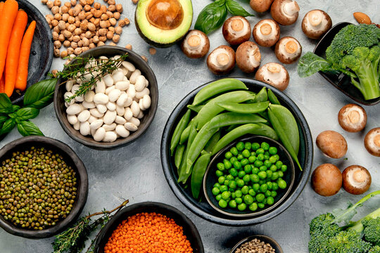 Natural sources of plant protein on light background.