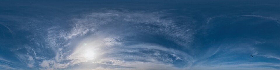 Blue sky panorama with Cirrus clouds. Seamless hdr 360 degree pano in spherical equirectangular format. Complete zenith for 3D visualization, game and sky replacement for aerial drone 360 panoramas.