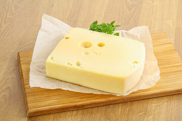 Maasdam cheese over the board