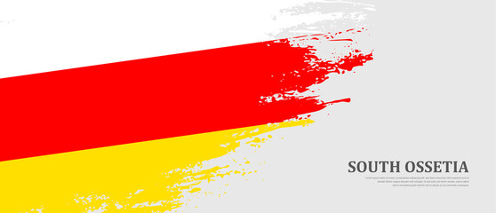 National flag of South Ossetia with textured brush flag. Artistic hand drawn brush flag banner background
