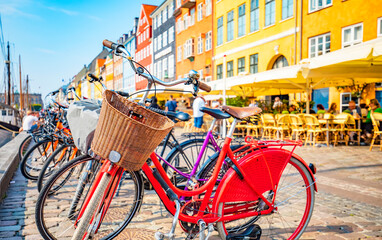 Copenhagen old town, Denmark. Nyhavn harbor, selective focus on bicycle - obrazy, fototapety, plakaty
