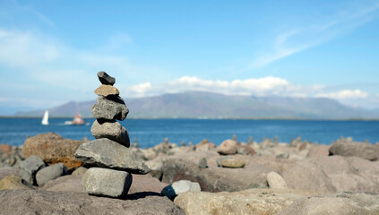 Balance - stacked stones at the coast of Reykjavik, Iceland