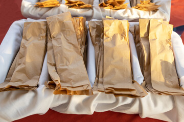 cutlery in paper packaging on the table