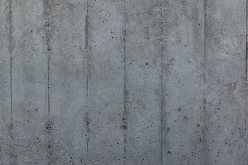 Reinforced concrete background. Surface of old and dirty reinforced concrete with traces of wooden formwork.