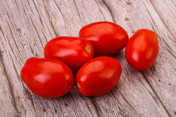 Red bright tasty tomato heap