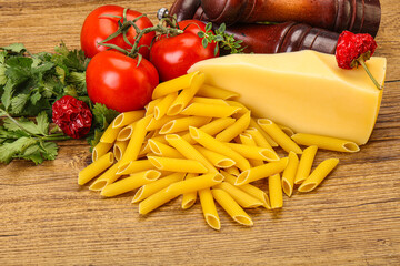 Raw penne rigate for cooking