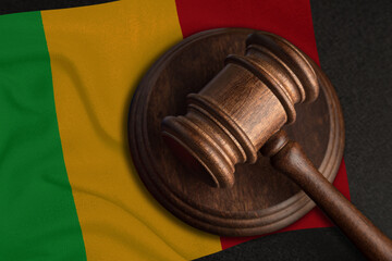 Judge Gavel and flag of Mali. Law and justice in Mali. Violation of rights and freedoms