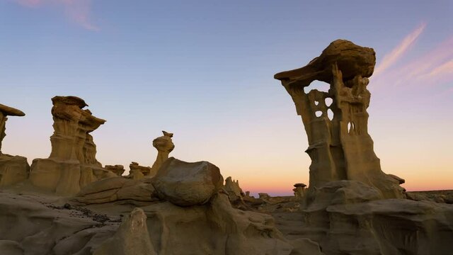 Time lapse tracking shot of sunrise at Alien Thorne in Valley of Dreams in Bisti Wilderness in New Mexico