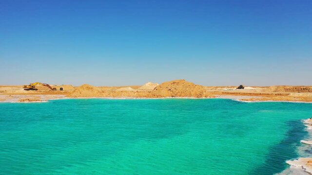 Aerial: Beautiful Shot Of Salt Lake Amidst Landscape Against Clear On Sunny Day - Siwa Oasis, Egypt