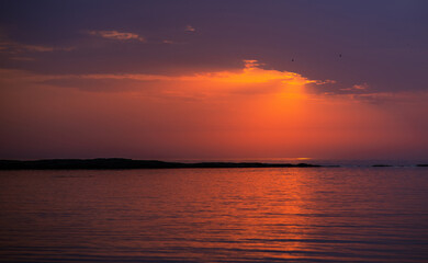 Fototapeta na wymiar Sunrise over the Caspian Sea. Beautiful cloudscape over the sea, sunrise shot