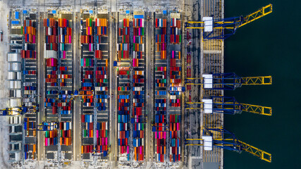 Aerial view commercial sea port warehouse and crane ship, Container ship at industrial port in...