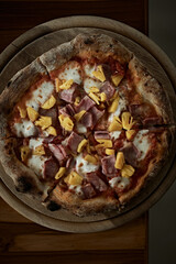 Pizza with bacon and sausage.