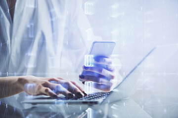 Double exposure of technology sketch hologram and woman holding and using a mobile device. Ai concept