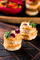 Toasted bread with liver pate. Gourmet appetizers Variety of mini sandwiches