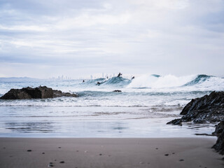 Surfers in the waves
