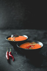 Tasty tomato soup. Fresh cream soup.Organic meal. Vegan food. Mediterranean cuisine. Dish in bowl.  