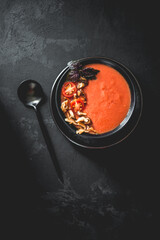Tasty tomato soup. Fresh cream soup.Organic meal. Vegan food. Mediterranean cuisine. Dish in bowl.  