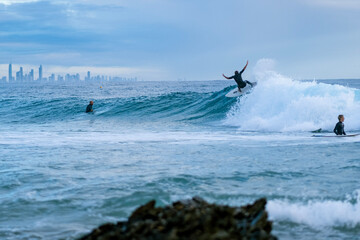 Surfer mid “snap” at Snapper Rocks, Coolangatta Australia 