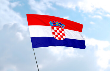 Flag of Croatia, realistic 3d rendering in front of blue sky