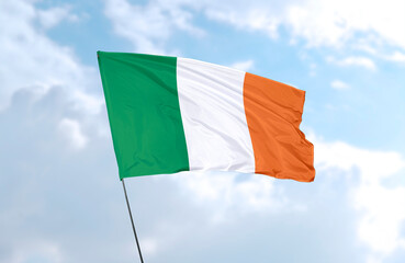 Flag of Ireland, realistic 3d rendering in front of blue sky