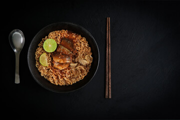 yummy instant noodles or ramen noodles with tuna fish and lemon slice