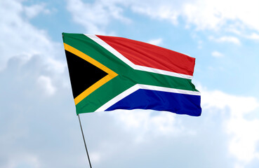 Flag of South Africa, realistic 3d rendering in front of blue sky