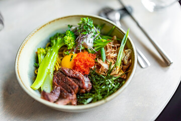 No Broth Mazemen Ramen with beef and Vegetables and caviar in bowl