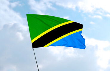 Flag of Tanzania, realistic 3d rendering in front of blue sky