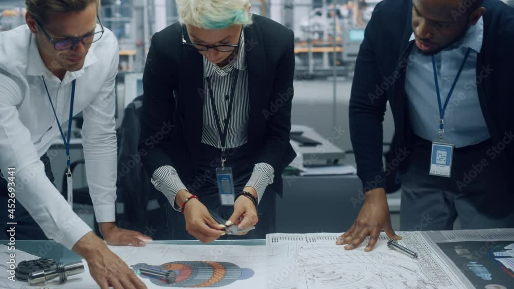 Aufkleber young diverse team of automotive engineers working in office at car factory. industrial designer tal