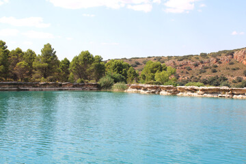 Fototapeta na wymiar Ruidera, Spain on August 18, 2021: Ruidera lagoons with turquoise blue water 