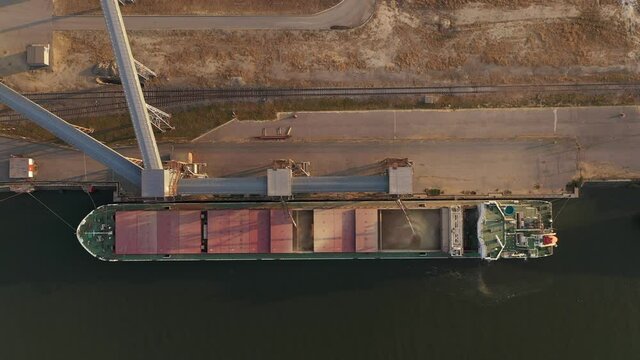 Loading ships with wheat grain for export in the port.  Aerial view