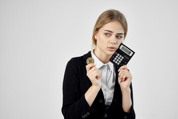 Businesswoman Bitcoin cryptocurrency in hands light background