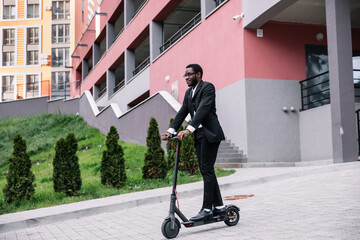 Student rides an electronic scooter to school. ecologically clea