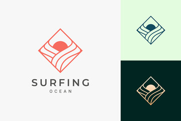 Ocean or surf logo in simple rhombus with wave and sun shape