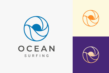 Sea or water theme logo with waves and sun in circle shape