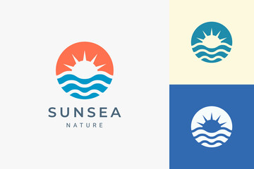 Beach or coast logo in simple sun and ocean shape