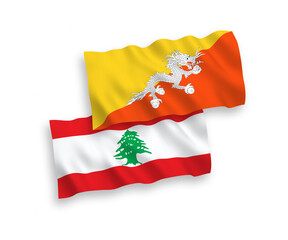National vector fabric wave flags of Kingdom of Bhutan and Lebanon isolated on white background. 1 to 2 proportion.