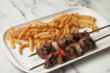 Kebab with fries