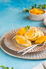 Sticky rice and mango crepe cake roll , .Hong Kong , Thai food style in summer