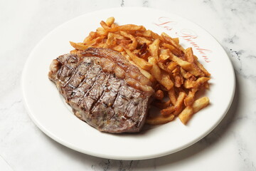steak with French fries