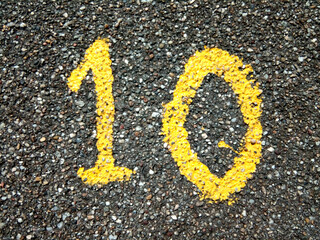 number ten painted on asphalt