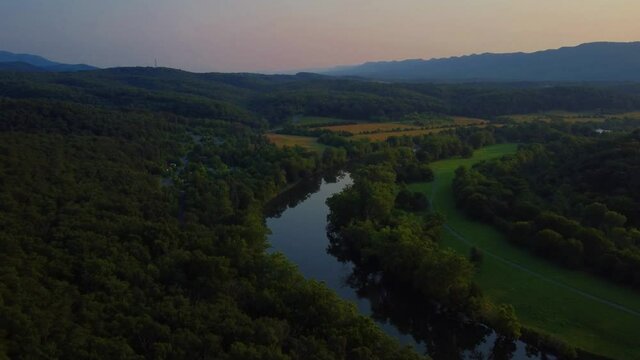 Amazing Aerial drone cinematic footage of Shenandoah River Valley golden hour paragliding around the Blue Ridge Mountains