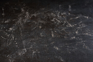 Obraz na płótnie Canvas White floured black kitchen top. Abstract background texture.