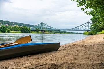 A blue folding kayak on the river Elbe