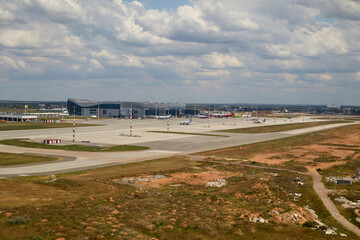 kazan, russia - 07.23.2021: runway with planes from the airport window