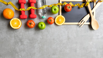 Diet Health eat and food for lifestyle health concept. Sport exercise workout and fresh fruit and measuring tape with backboard for fitness style. Nutrition Healthy Lifestyle Concept