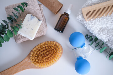 Flatlay spa items. massage jars and a brush. Body and face care. Massage cups for the face against wrinkles. Cosmetology, face massage, canned body massage, spa procedure.