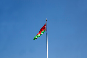 belarusian state flag on a blue sky