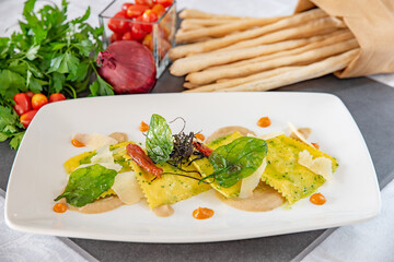 Italian ravioli served on a white plate